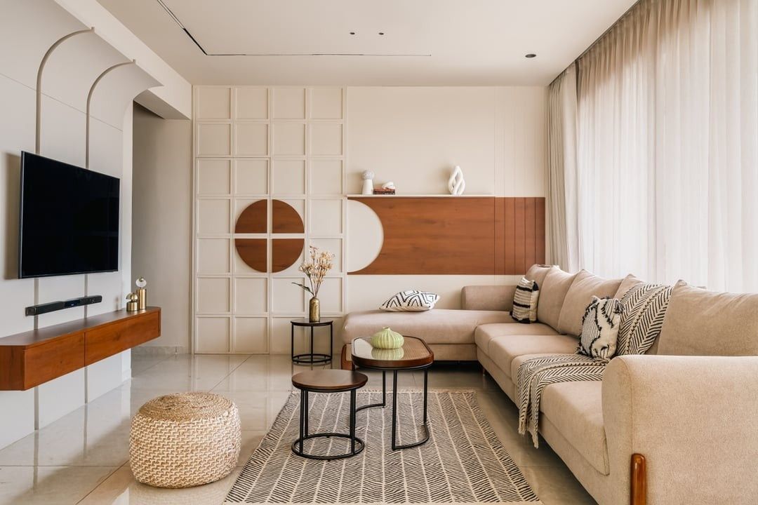 Warm residential living room with cream upholstered furniture